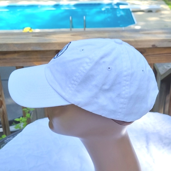 White cap, navy sailboat on light blue seersucker background,  adjustable back - Picture 6 of 8